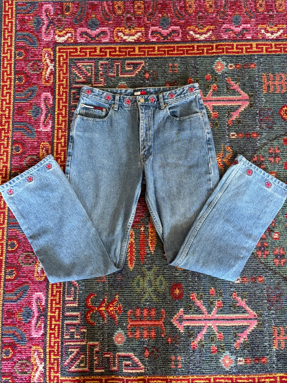 Tommy Hilfiger Jeans with red embroidered stars on waist and cuffs